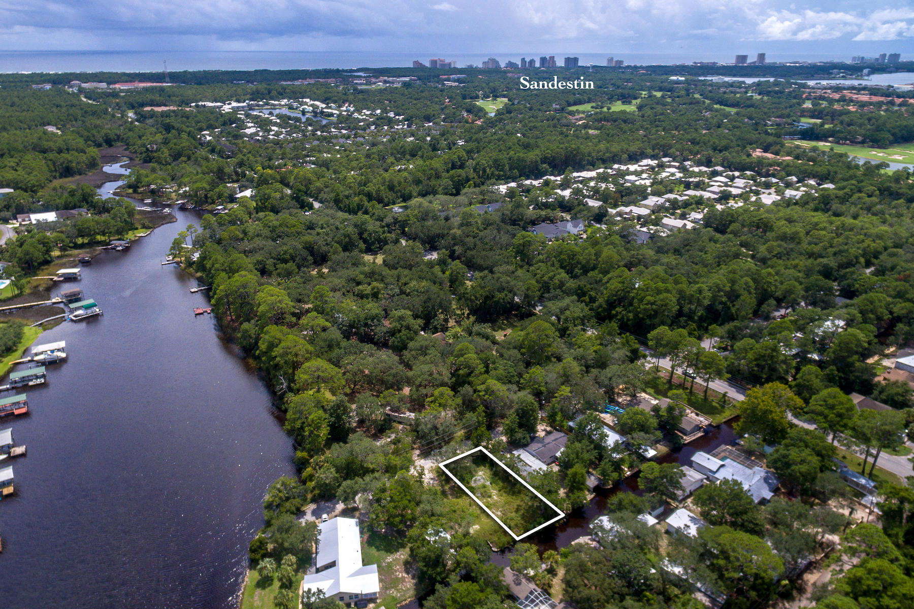 63 Bayou Road Santa Rosa Beach, FL 32459 - Photo 10 of 10 an aerial view of residential house with outdoor space and trees all around