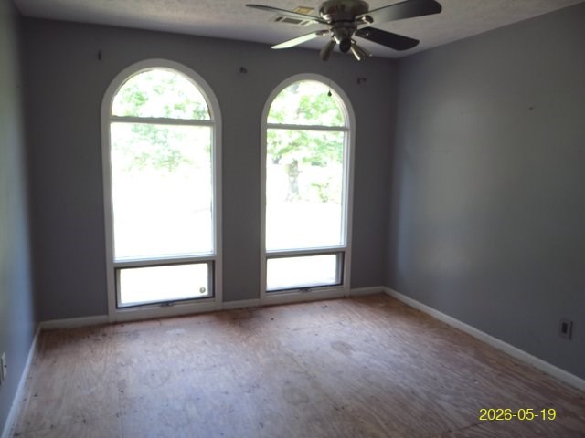 6730 Ranch Forest Drive Columbus, GA 31904 - Photo 9 of 17 an empty room with a window and a mirror