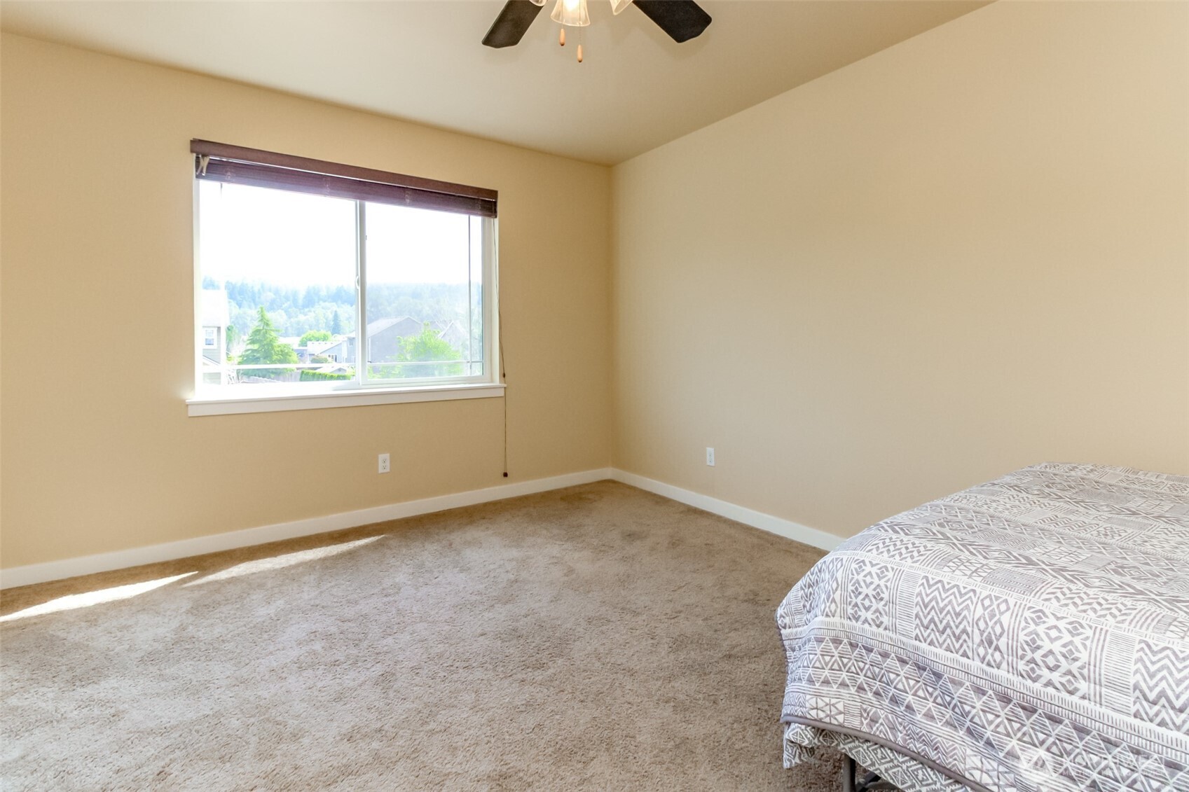 1605 Riddell Avenue Northeast Orting, WA 98360 - Photo 19 of 35 a view of an empty room and a window