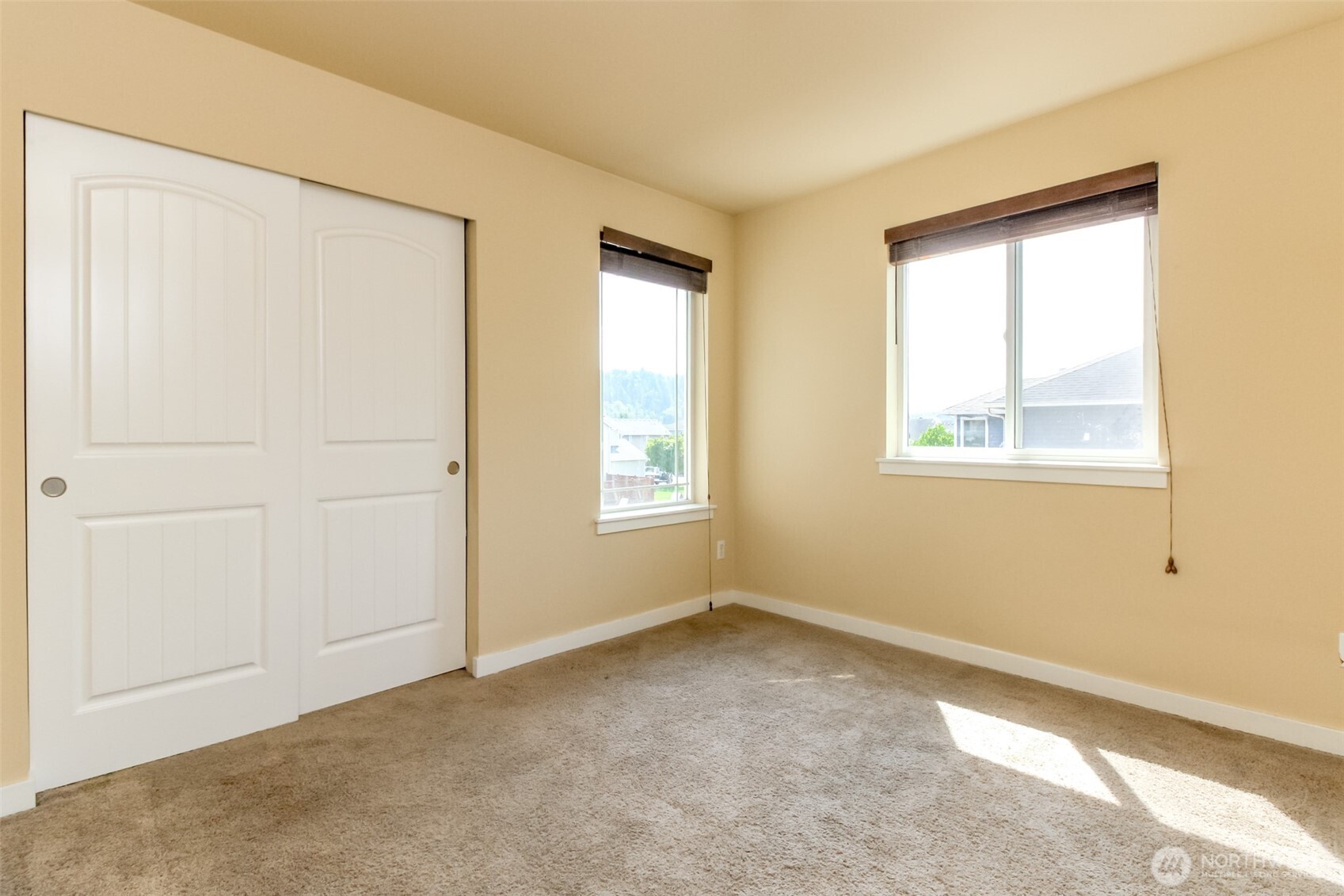 1605 Riddell Avenue Northeast Orting, WA 98360 - Photo 24 of 35 a view of an empty room with a window