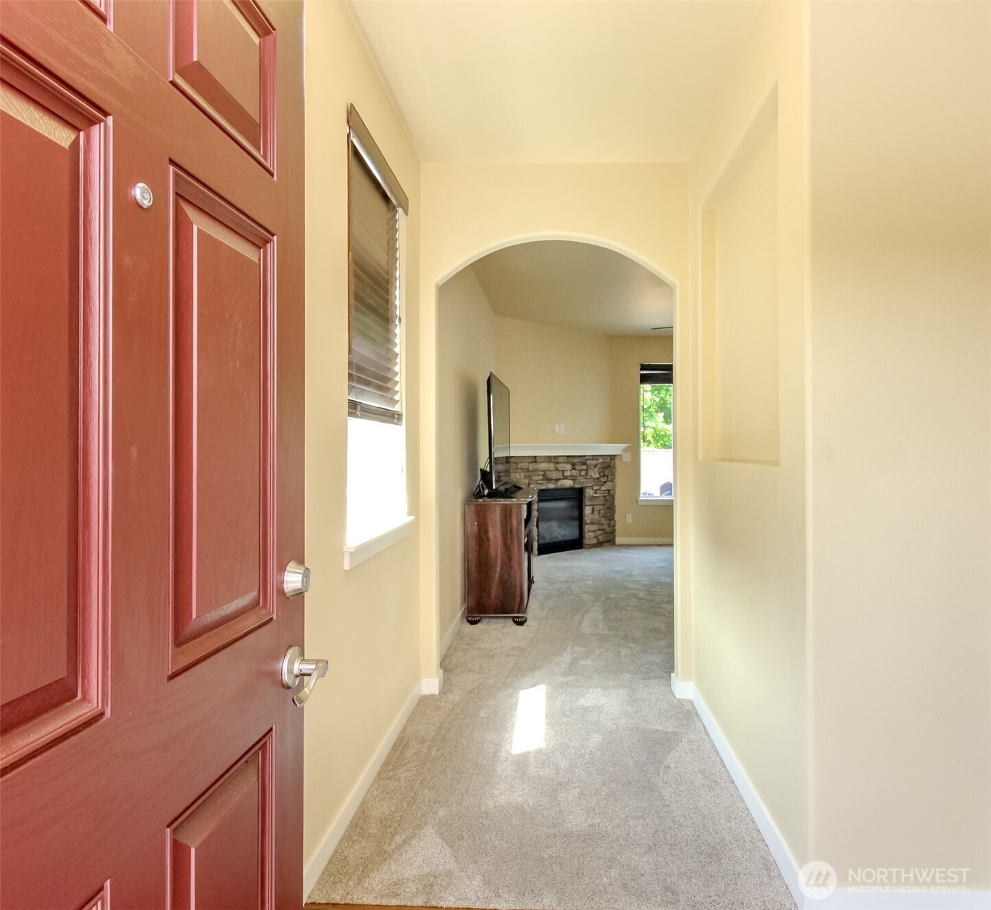 1605 Riddell Avenue Northeast Orting, WA 98360 - Photo 4 of 35 a view of a hallway with wooden shelves