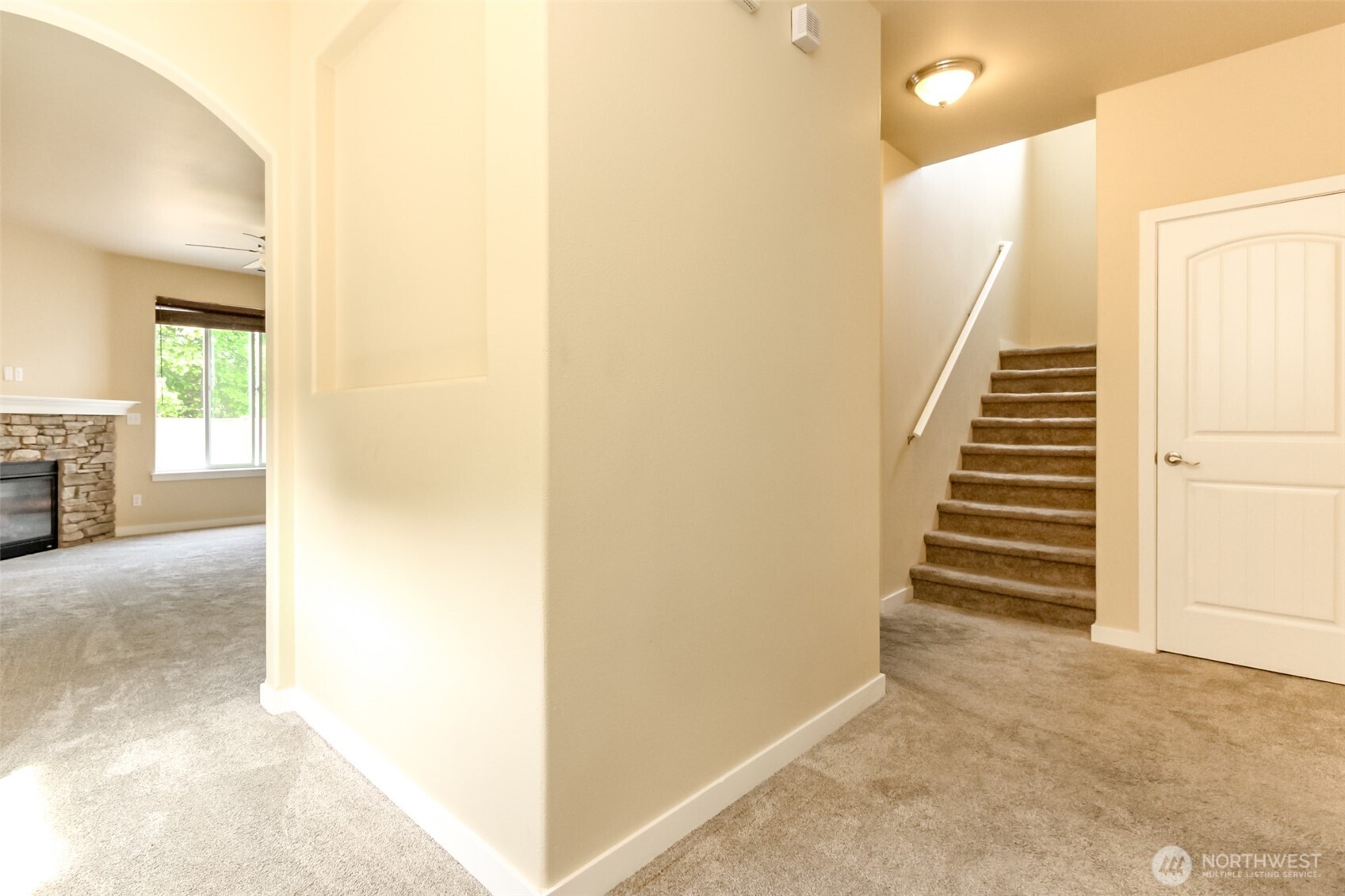 1605 Riddell Avenue Northeast Orting, WA 98360 - Photo 5 of 35 a view of entryway and hall with wooden floor