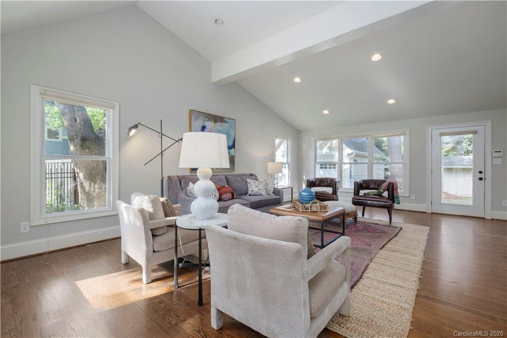 635 Marsh Road Charlotte, NC 28209 - Photo 12 of 48 a living room with fireplace furniture and a wooden floor