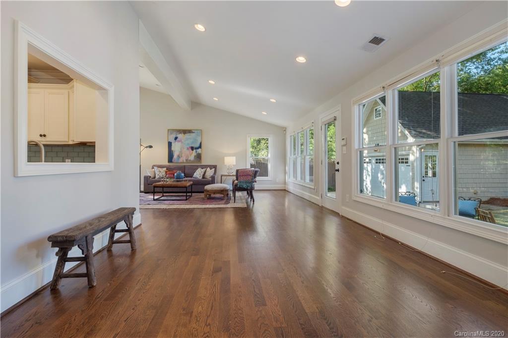 635 Marsh Road Charlotte, NC 28209 - Photo 15 of 48 a living room with furniture and a large window