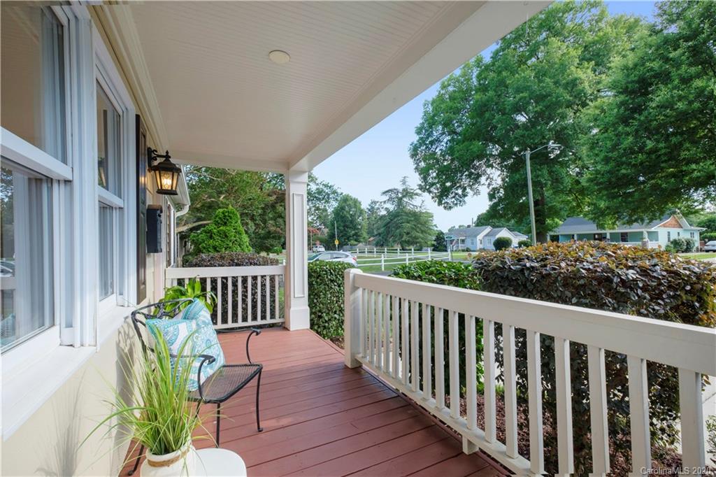 635 Marsh Road Charlotte, NC 28209 - Photo 4 of 48 a view of a chair in wooden deck