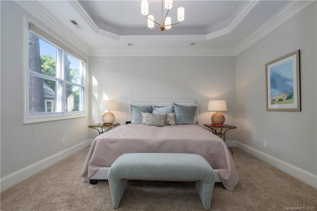 635 Marsh Road Charlotte, NC 28209 - Photo 34 of 48 a bedroom with bed and a window