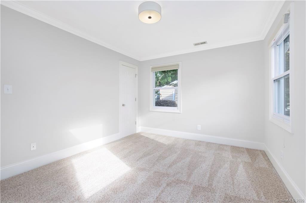 635 Marsh Road Charlotte, NC 28209 - Photo 40 of 48 an empty room with windows