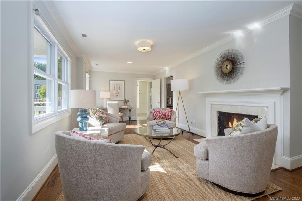 635 Marsh Road Charlotte, NC 28209 - Photo 5 of 48 a living room with furniture and a fireplace