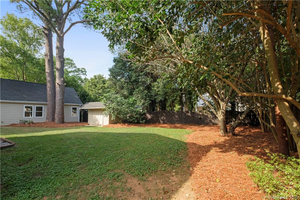 635 Marsh Road Charlotte, NC 28209 - Photo 47 of 48 a view of house with outdoor space and garden