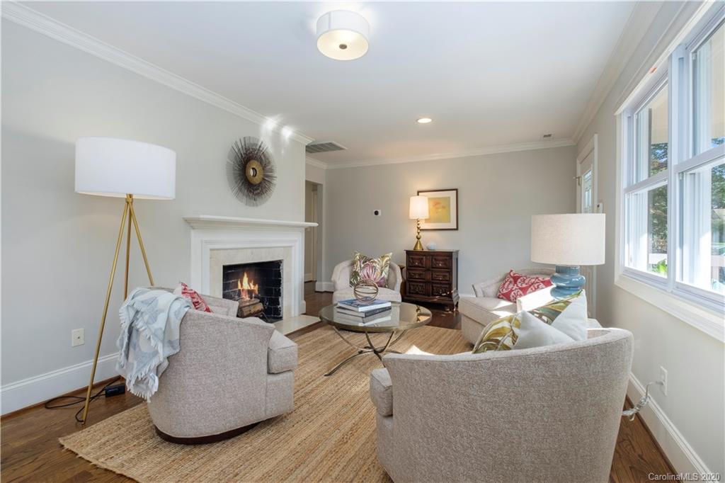 635 Marsh Road Charlotte, NC 28209 - Photo 6 of 48 a living room with furniture and a fireplace