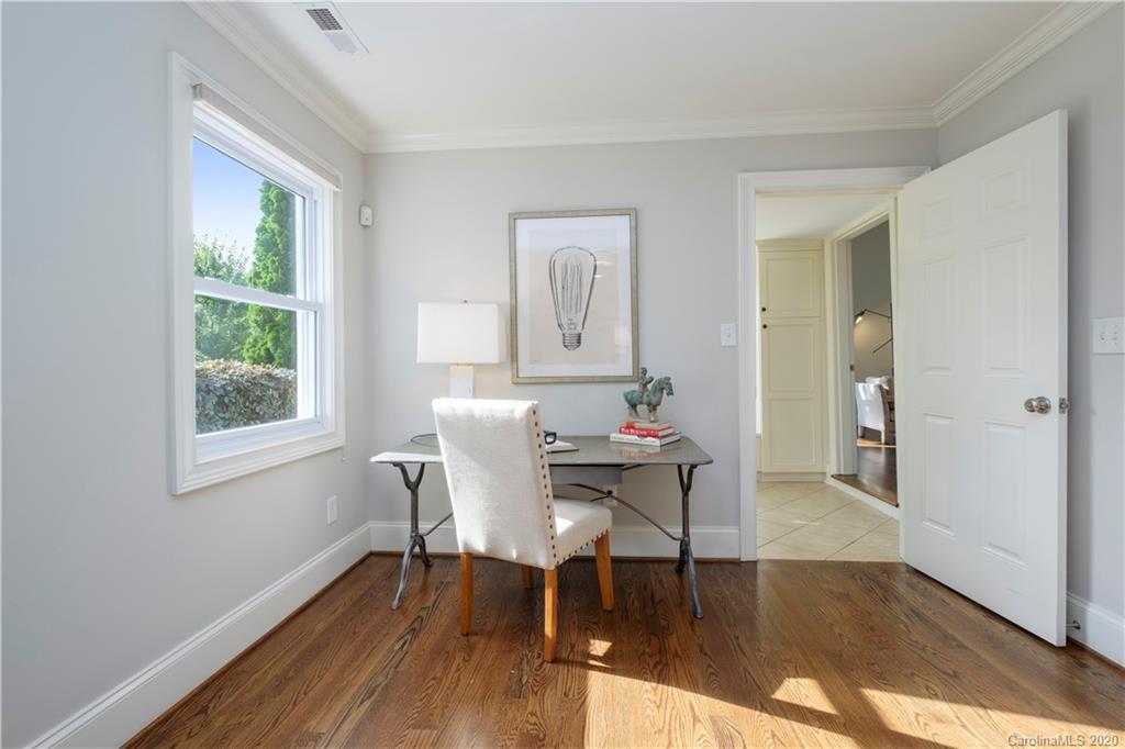 635 Marsh Road Charlotte, NC 28209 - Photo 9 of 48 a view of a dining room with furniture and wooden floor