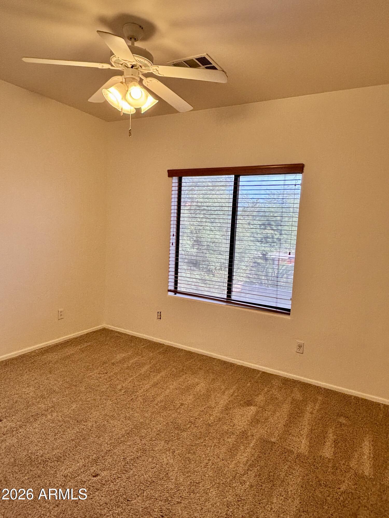 160 North Pottebaum Road Casa Grande, AZ 85122 - Photo 34 of 47 an empty room with a window