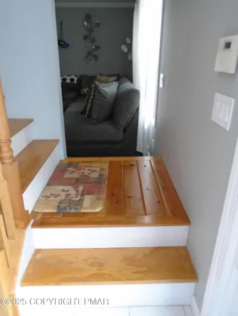 a living room with furniture and a couch