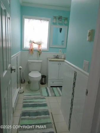 a view of a hallway with washer and dryer