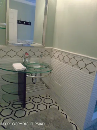 a bathroom with a sink and a toilet