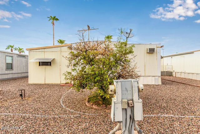 a view of a house with a potted plant