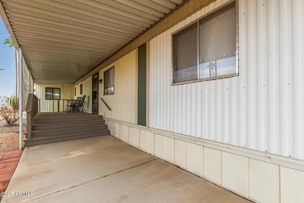 a view of entryway with a front door