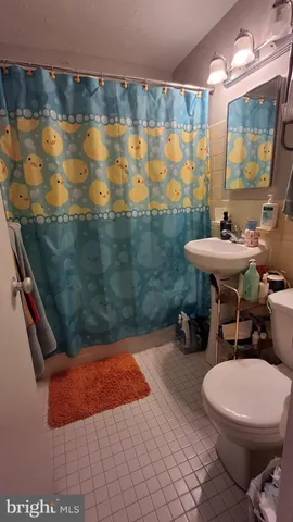 a front view of a building with glass windows and door