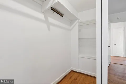 a view of a room with racks on the wall