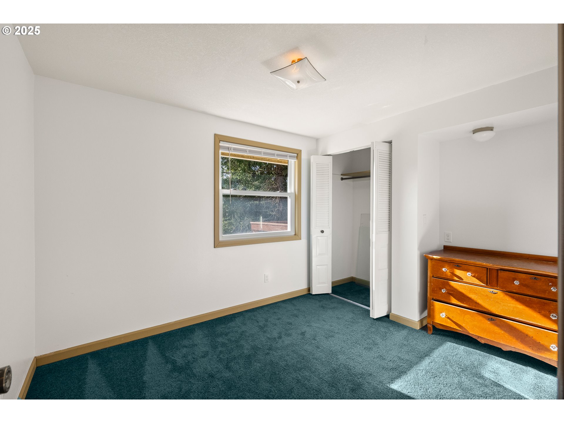 1521 Ranch Road Reedsport, OR 97467 - Photo 20 of 44 a backyard of a house with window