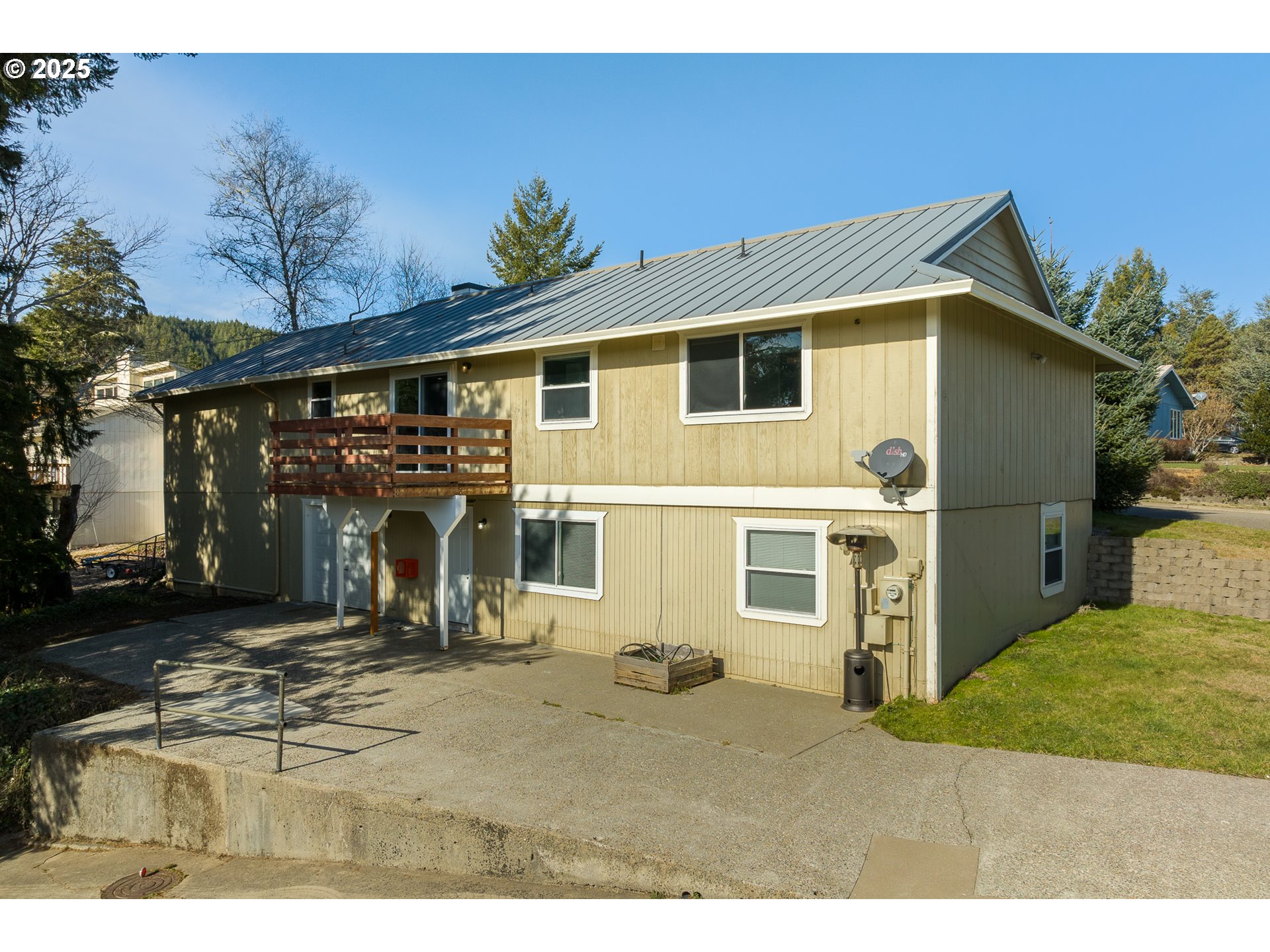 1521 Ranch Road Reedsport, OR 97467 - Photo 2 of 44 a view of a house with backyard