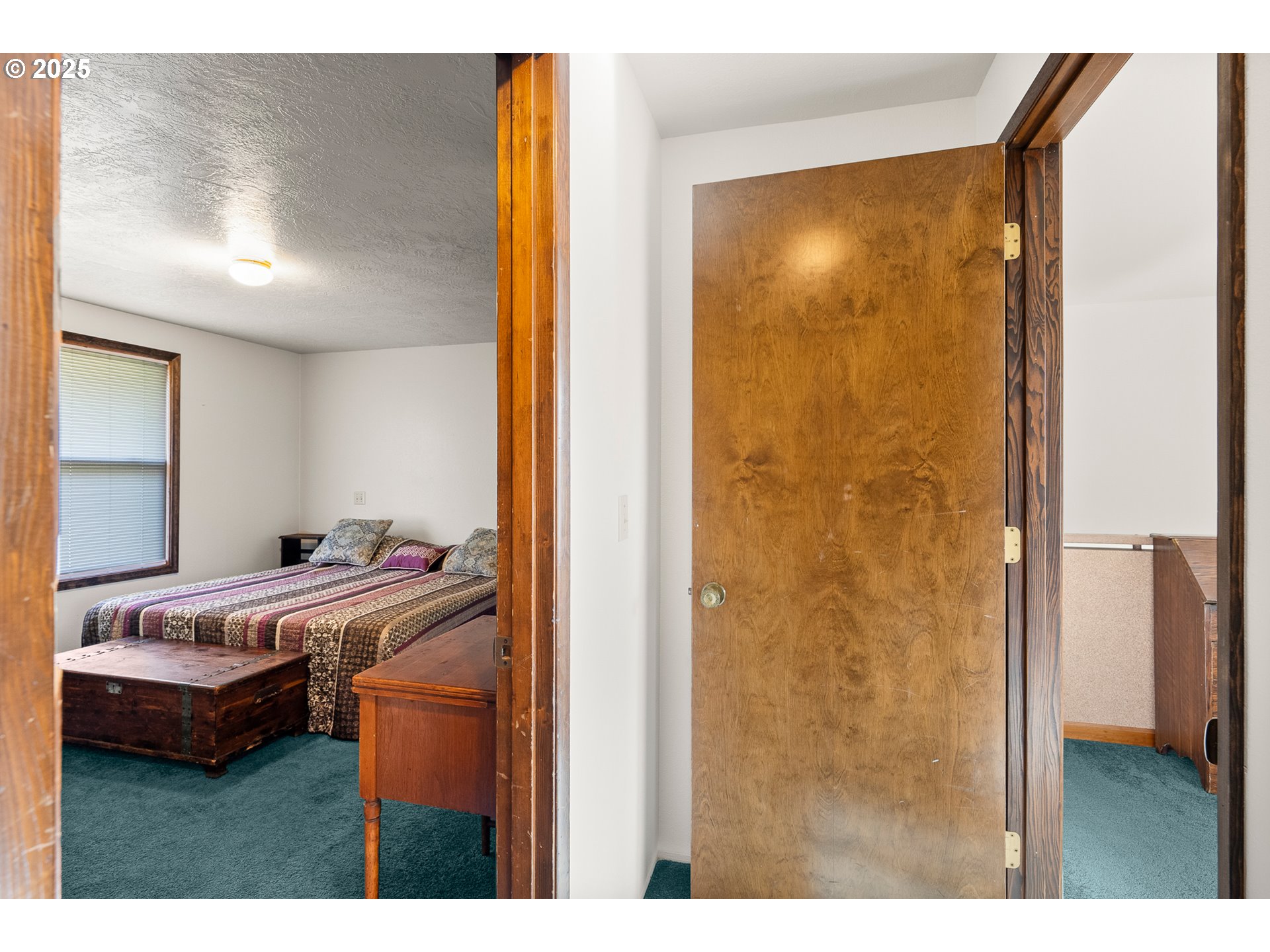 1521 Ranch Road Reedsport, OR 97467 - Photo 22 of 44 a bedroom with a bed and a mirror