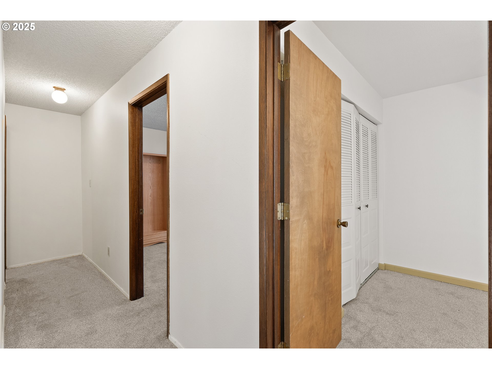 1521 Ranch Road Reedsport, OR 97467 - Photo 29 of 44 a view of an empty room with wooden floor