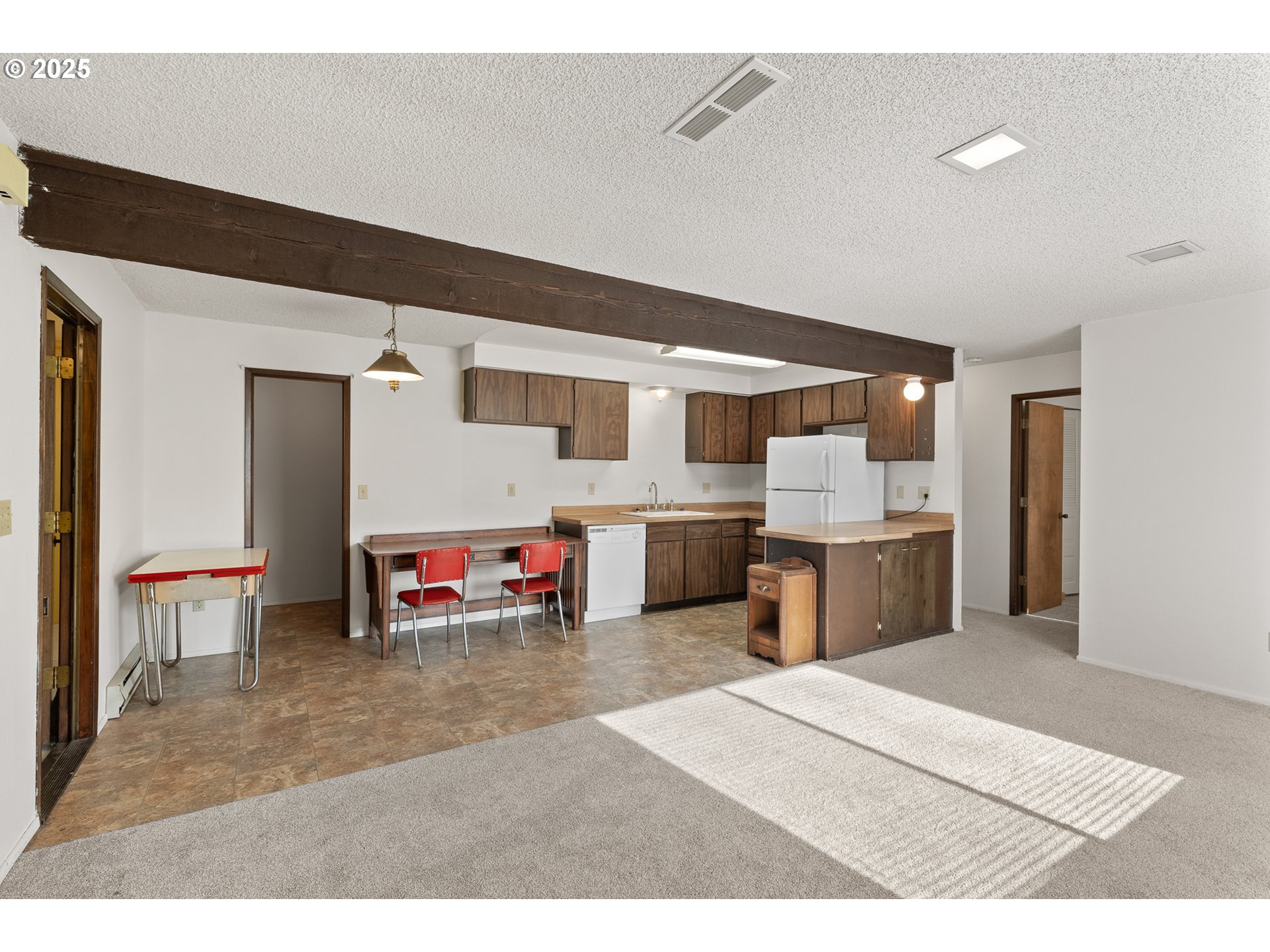 1521 Ranch Road Reedsport, OR 97467 - Photo 35 of 44 a kitchen with stainless steel appliances kitchen island granite countertop a sink and cabinets