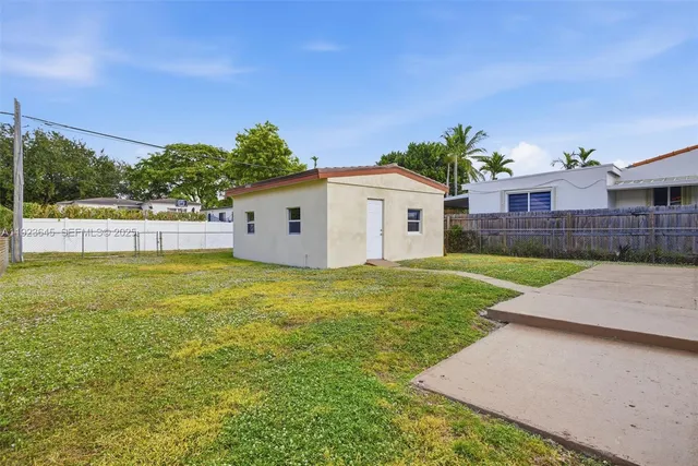 a house view with a garden space