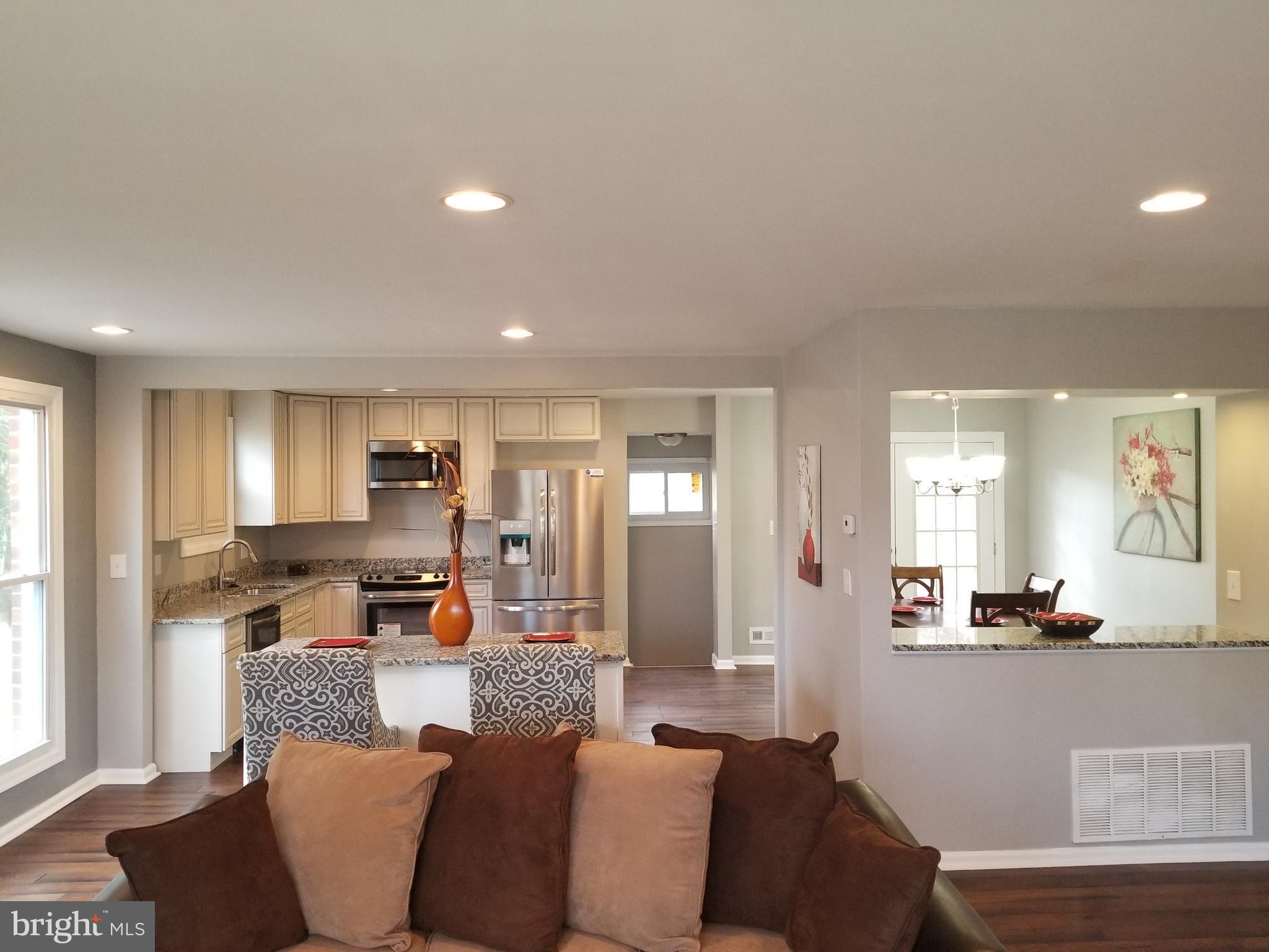 3704 Cassen Road Randallstown, MD 21133 - Photo 6 of 15 a living room with furniture and a large window