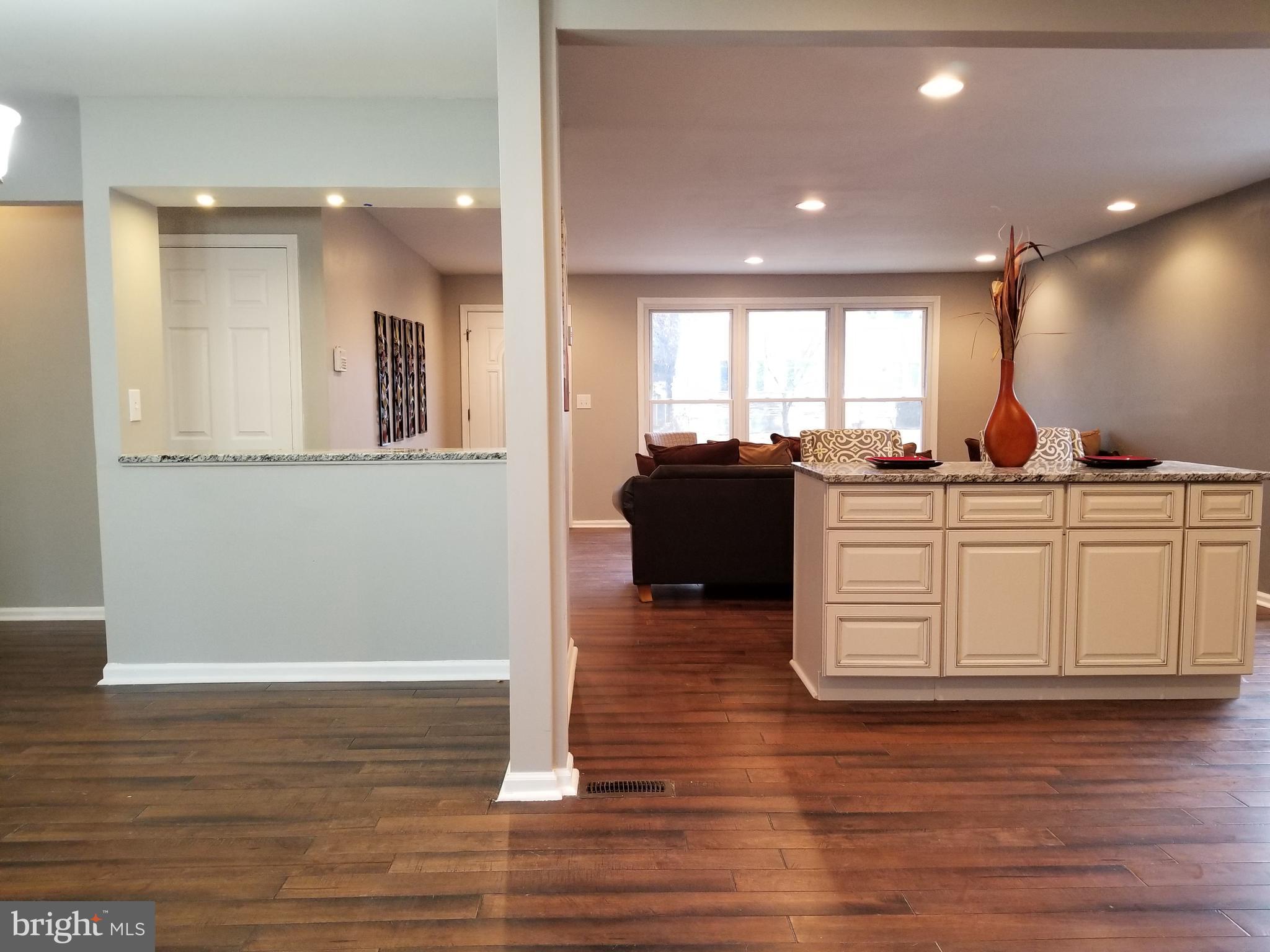 3704 Cassen Road Randallstown, MD 21133 - Photo 7 of 15 a view of kitchen with wooden floor