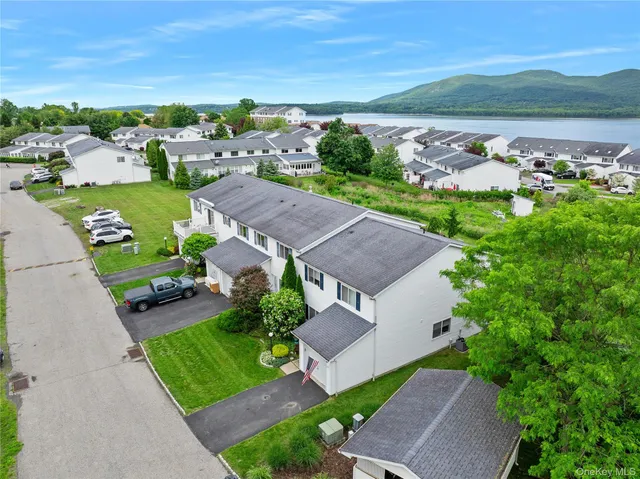 an aerial view of a house with a garden