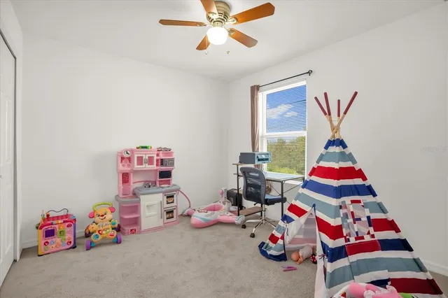 a room with toys and a wooden floor