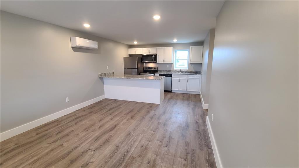 1331 Freeport Road Cheswick, PA 15024 - Photo 13 of 32 a view of kitchen with wooden floor and electronic appliances