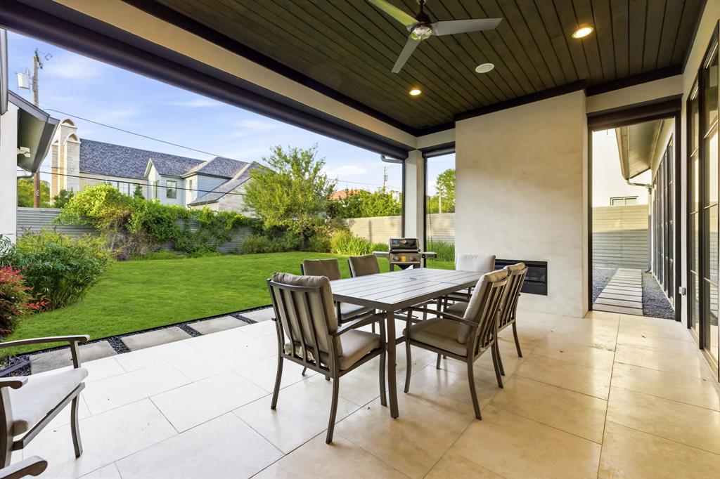 6523 Northwood Road Dallas, TX 75225 - Photo 31 of 36 a view of a patio with table and chairs and potted plants