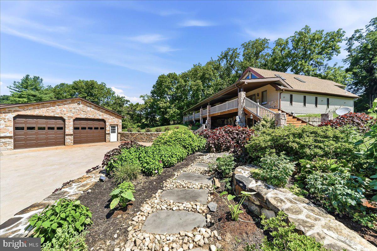 Charming home with lush landscaping.