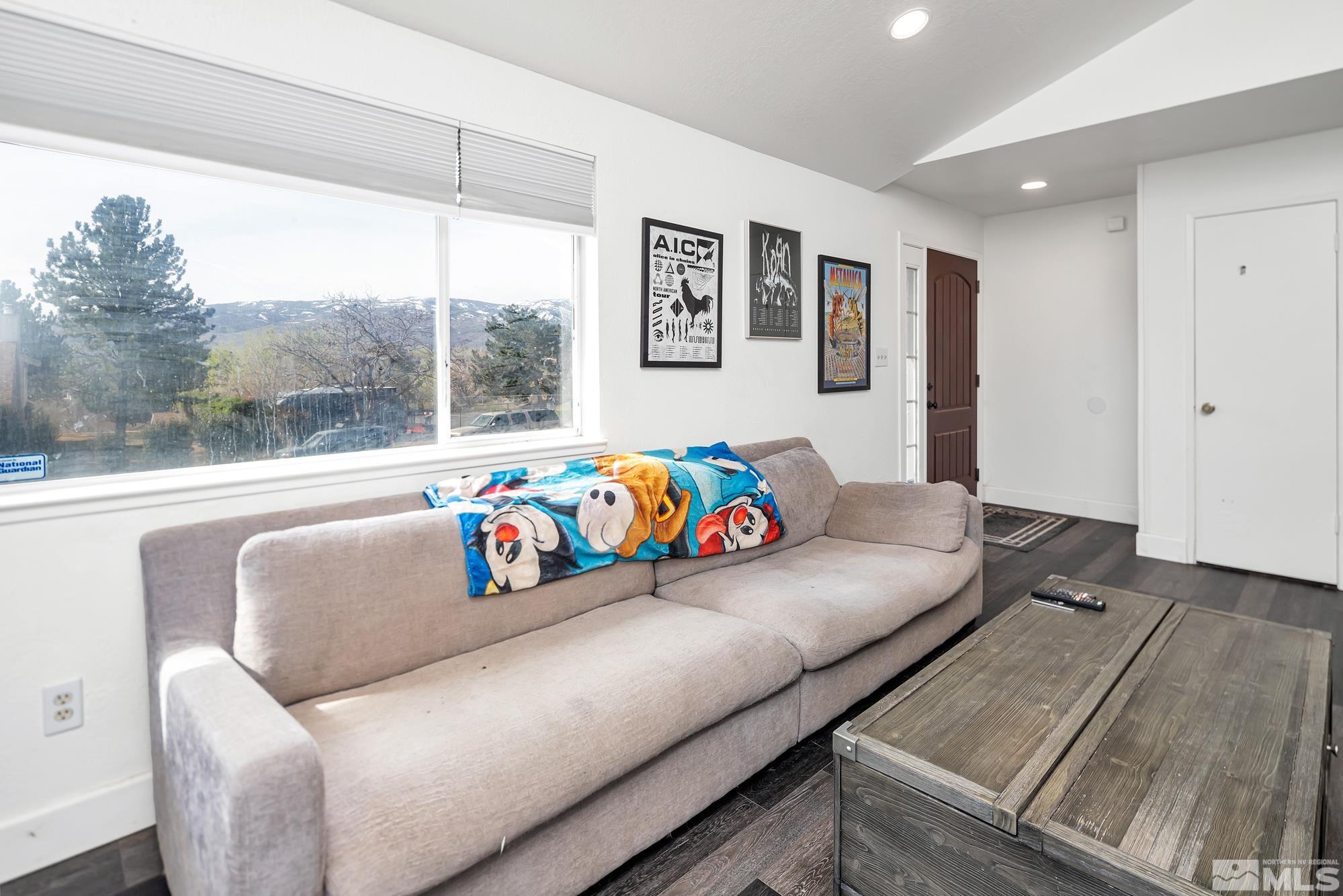 3435 Bowie Road Reno, NV 89503 - Photo 3 of 22 a living room with a couch and a window