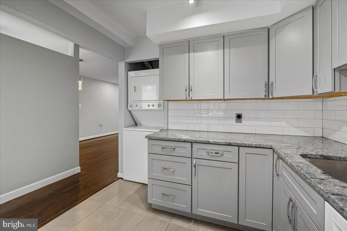 3940 Bel Pre Road, Unit 6 Silver Spring, MD 20906 - Photo 11 of 29 Modern kitchen with sleek finishes.