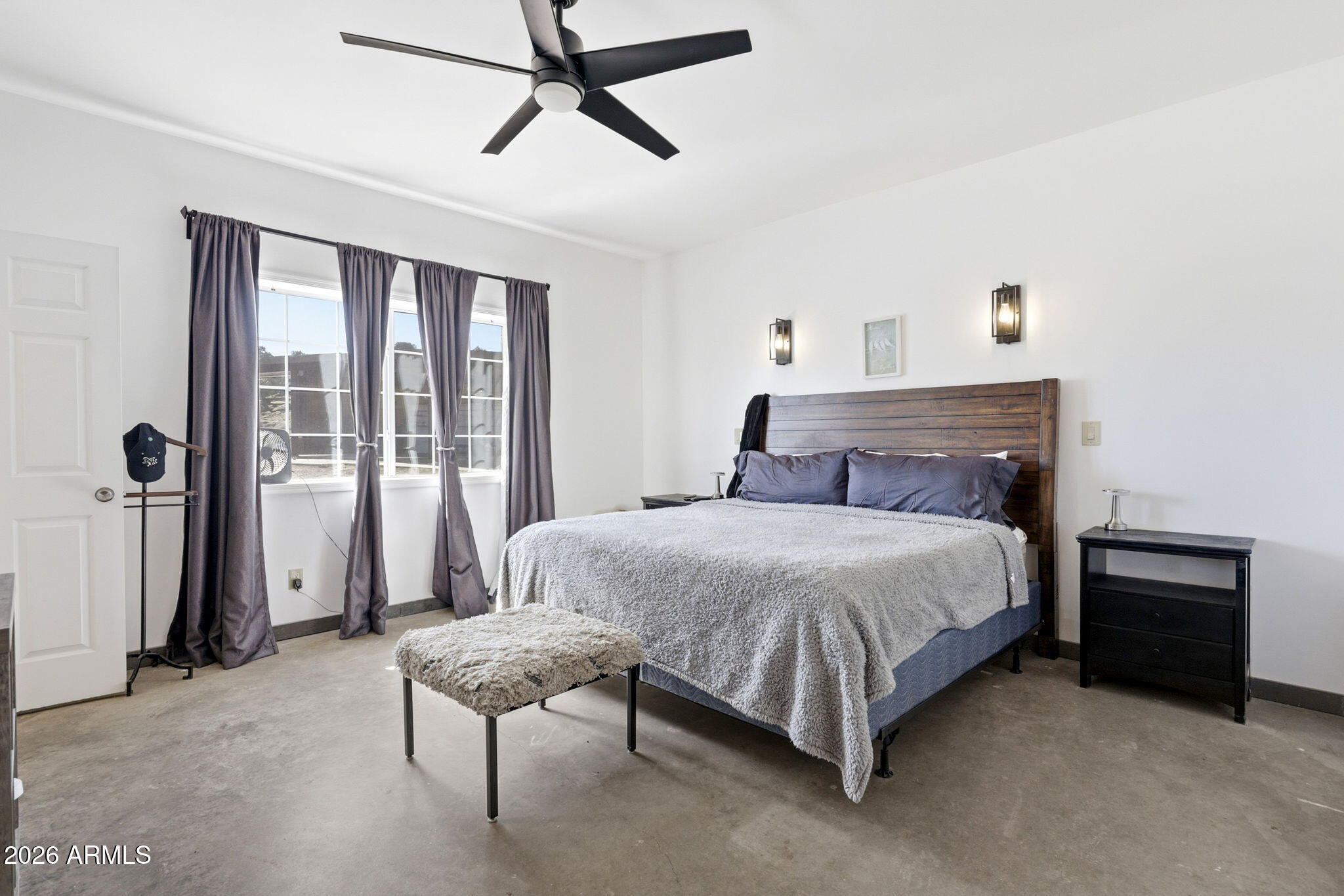 77 N8543 Concho, AZ 85924 - Photo 10 of 44 a bedroom with a bed and a chandelier