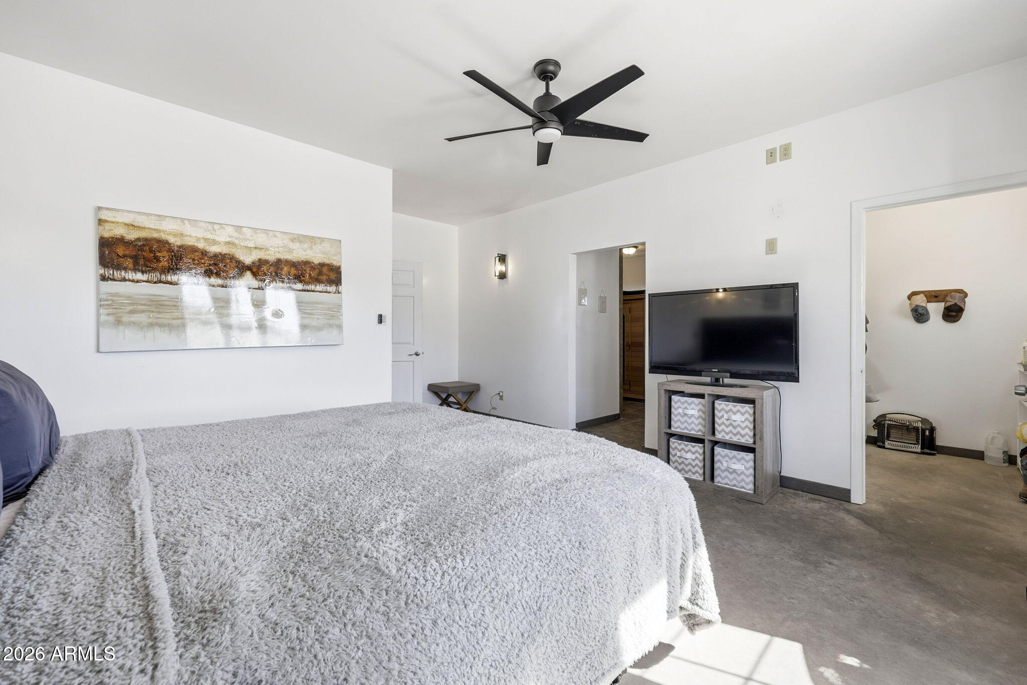 77 N8543 Concho, AZ 85924 - Photo 11 of 44 a bedroom with a bed and a flat screen tv