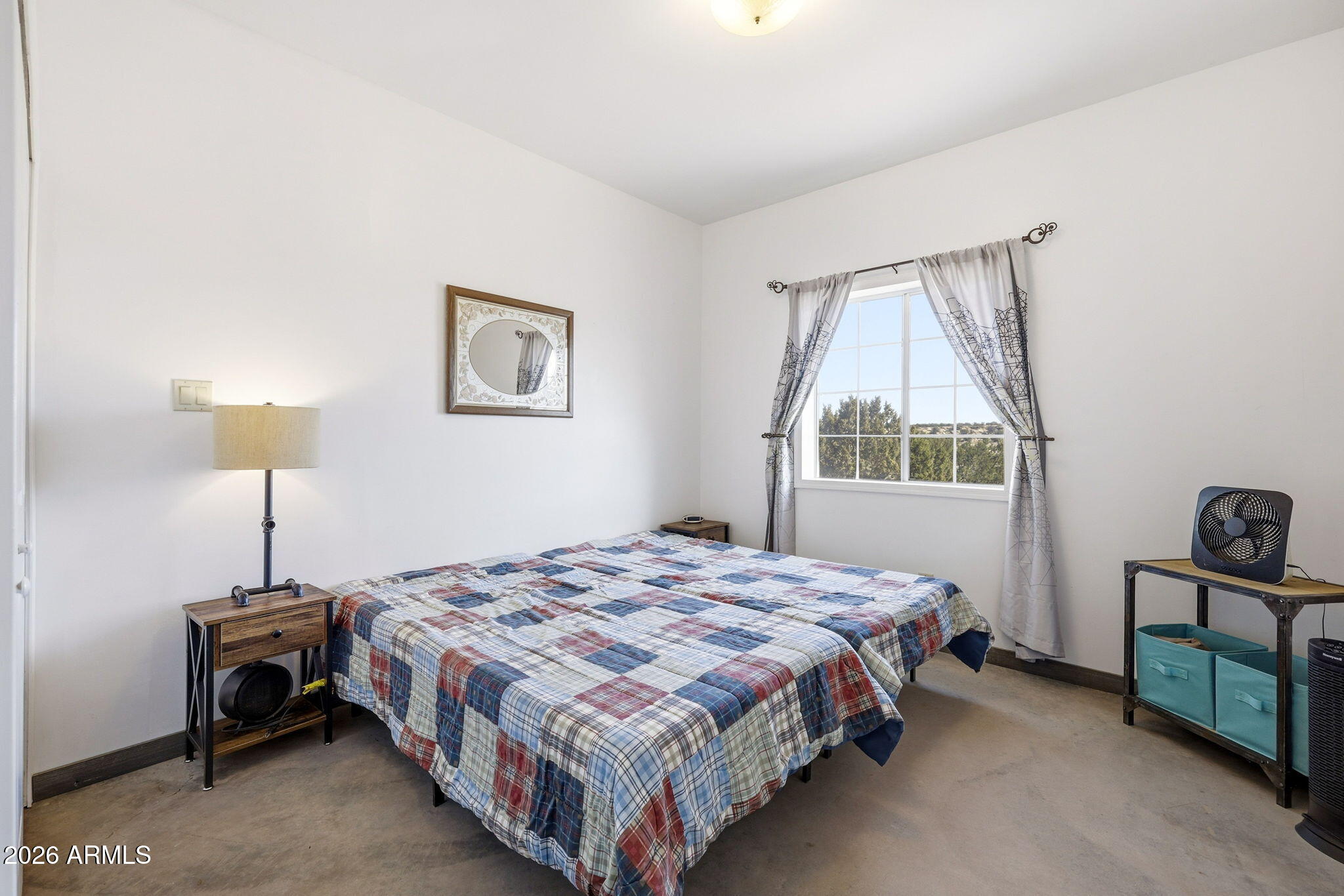 77 N8543 Concho, AZ 85924 - Photo 17 of 44 a bedroom with a bed and a lamp