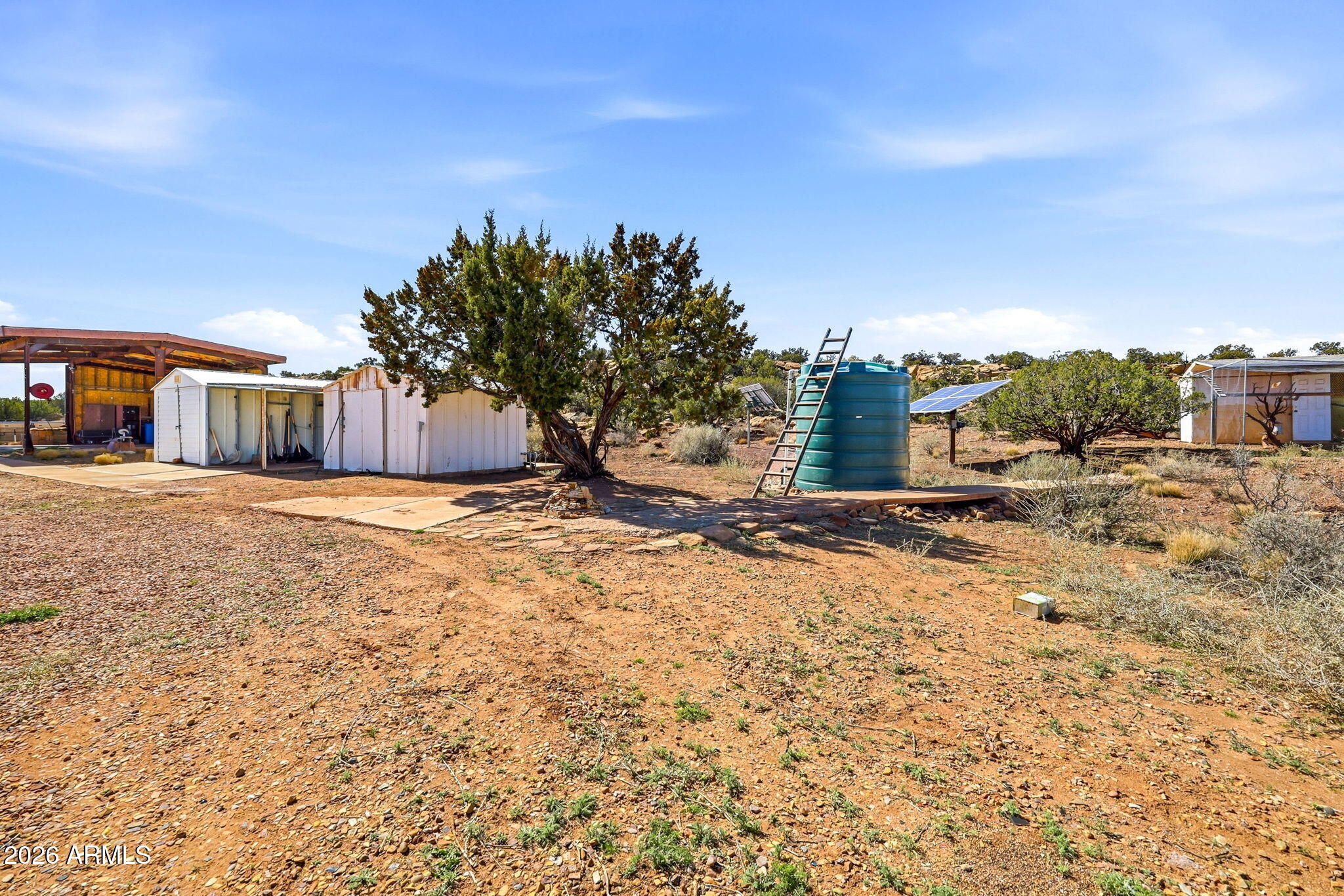 77 N8543 Concho, AZ 85924 - Photo 28 of 44 a view of a yard with wooden fence