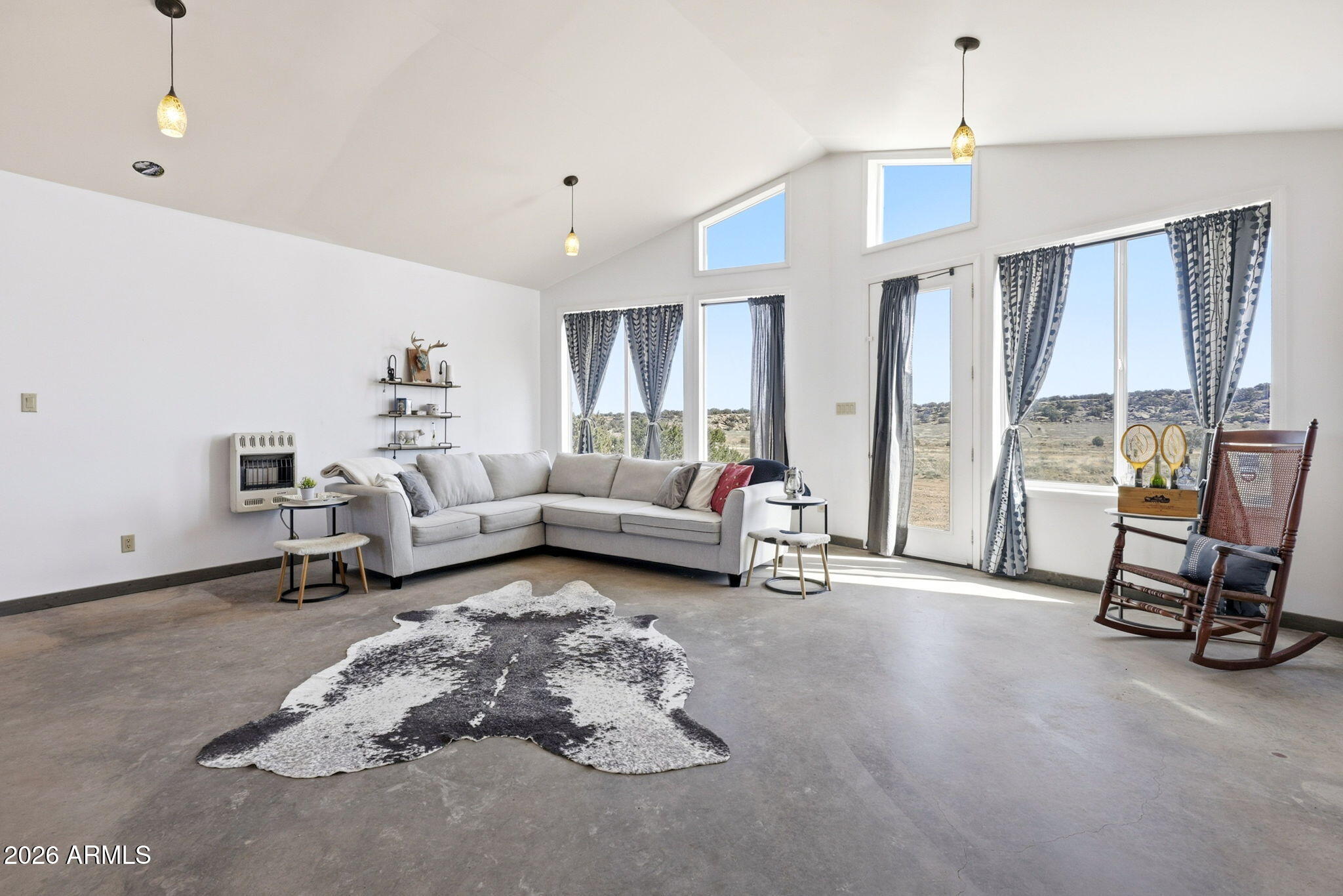 77 N8543 Concho, AZ 85924 - Photo 2 of 44 a living room with furniture and a large window