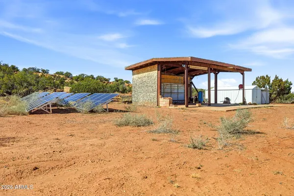 a view of large house with a swimming pool