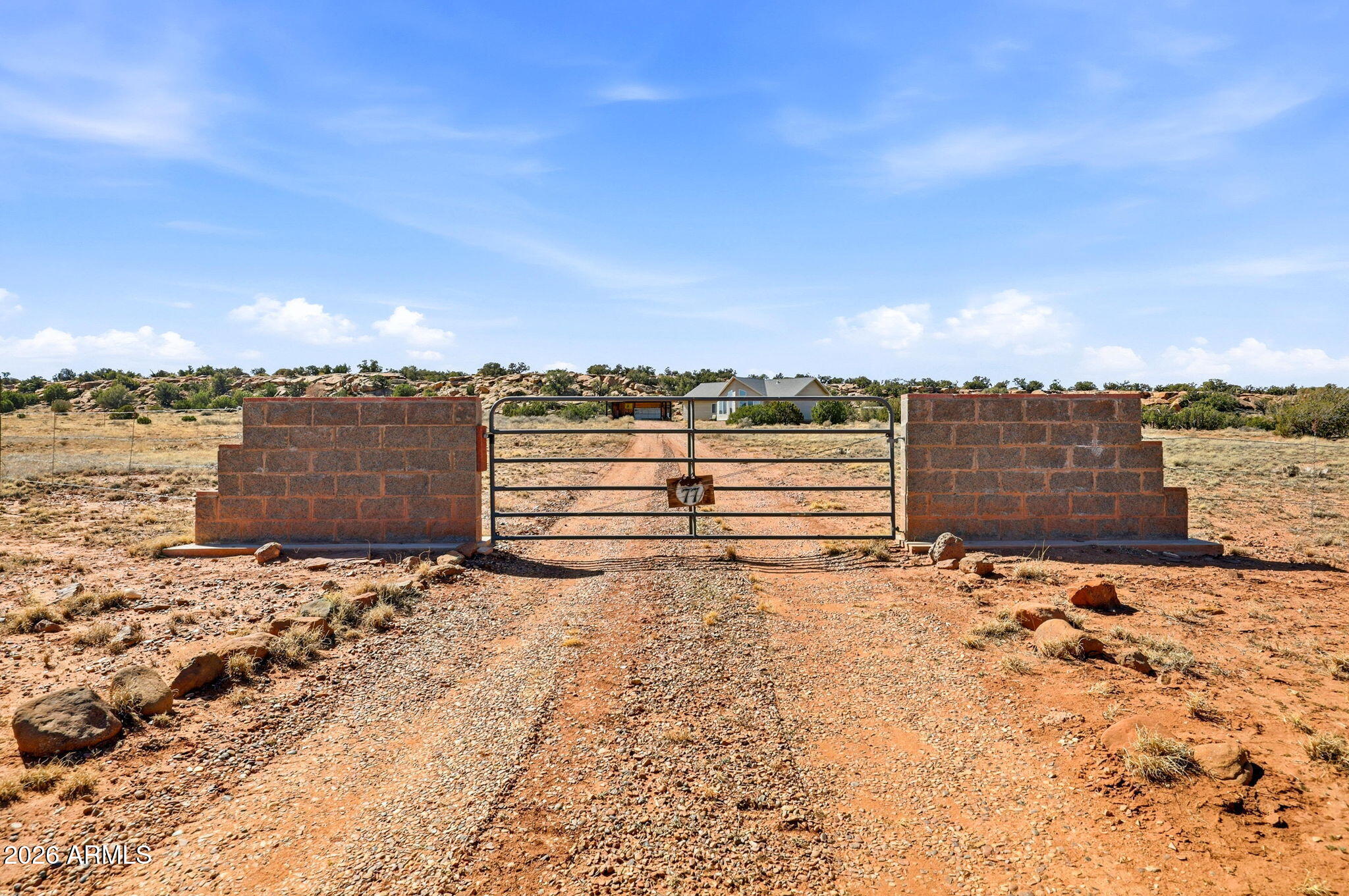 77 N8543 Concho, AZ 85924 - Photo 31 of 44 a view of a dry yard with wooden fence