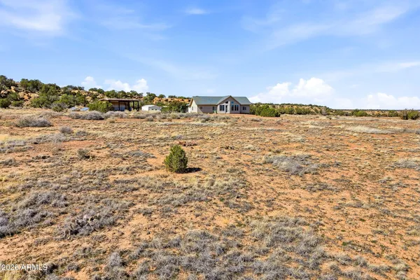 a view of a lake with a city