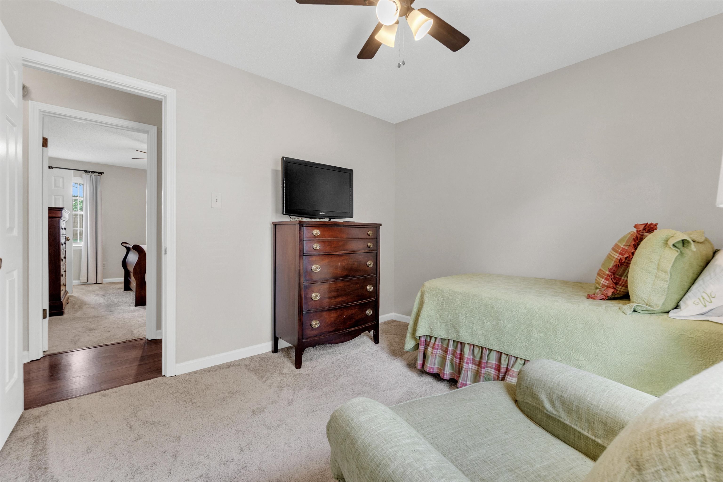 7255 Barnstable Road Memphis, TN 38125 - Photo 20 of 27 Carpeted bedroom with baseboards and a ceiling fan
