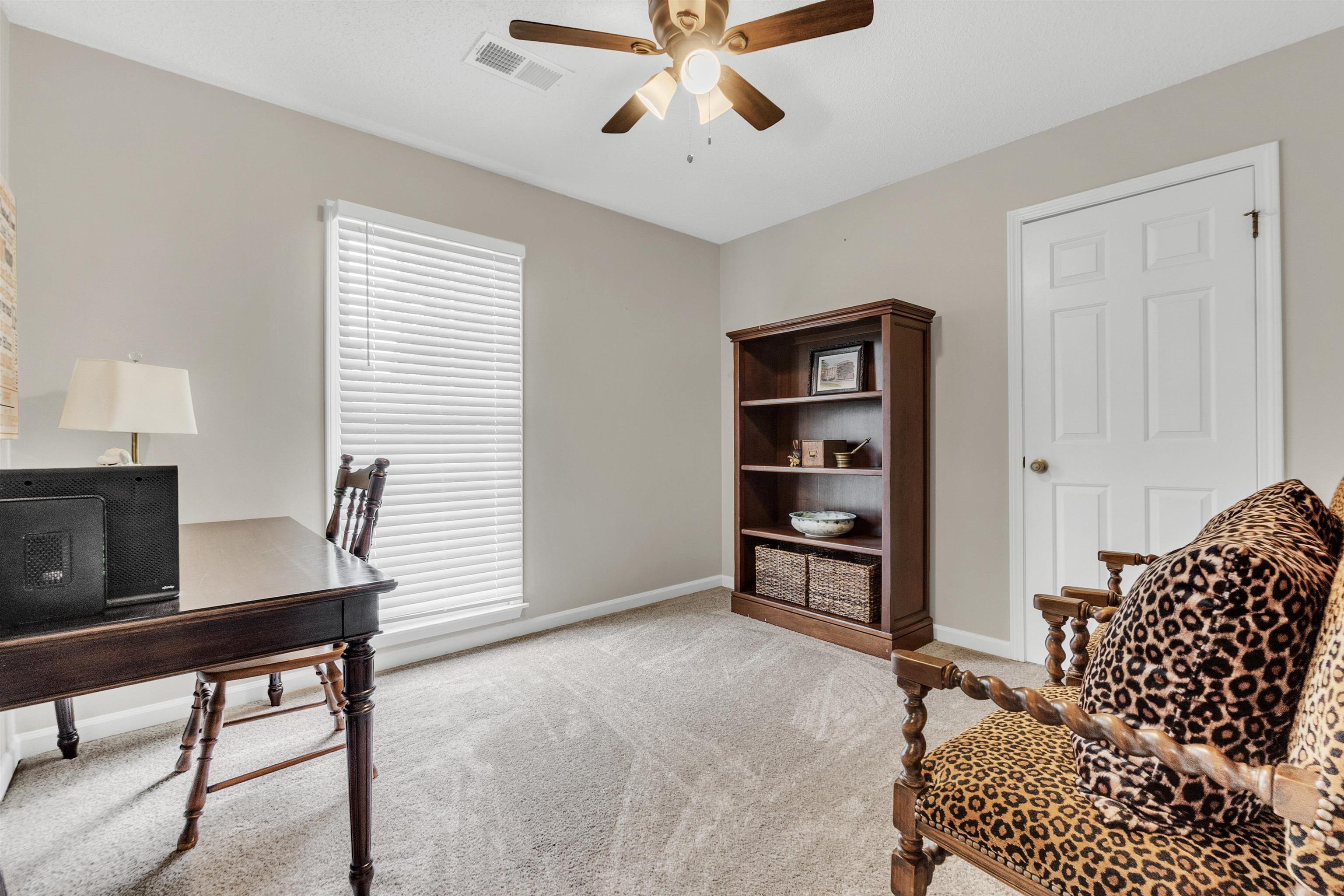7255 Barnstable Road Memphis, TN 38125 - Photo 22 of 27 Office area with a ceiling fan, carpet, and baseboards