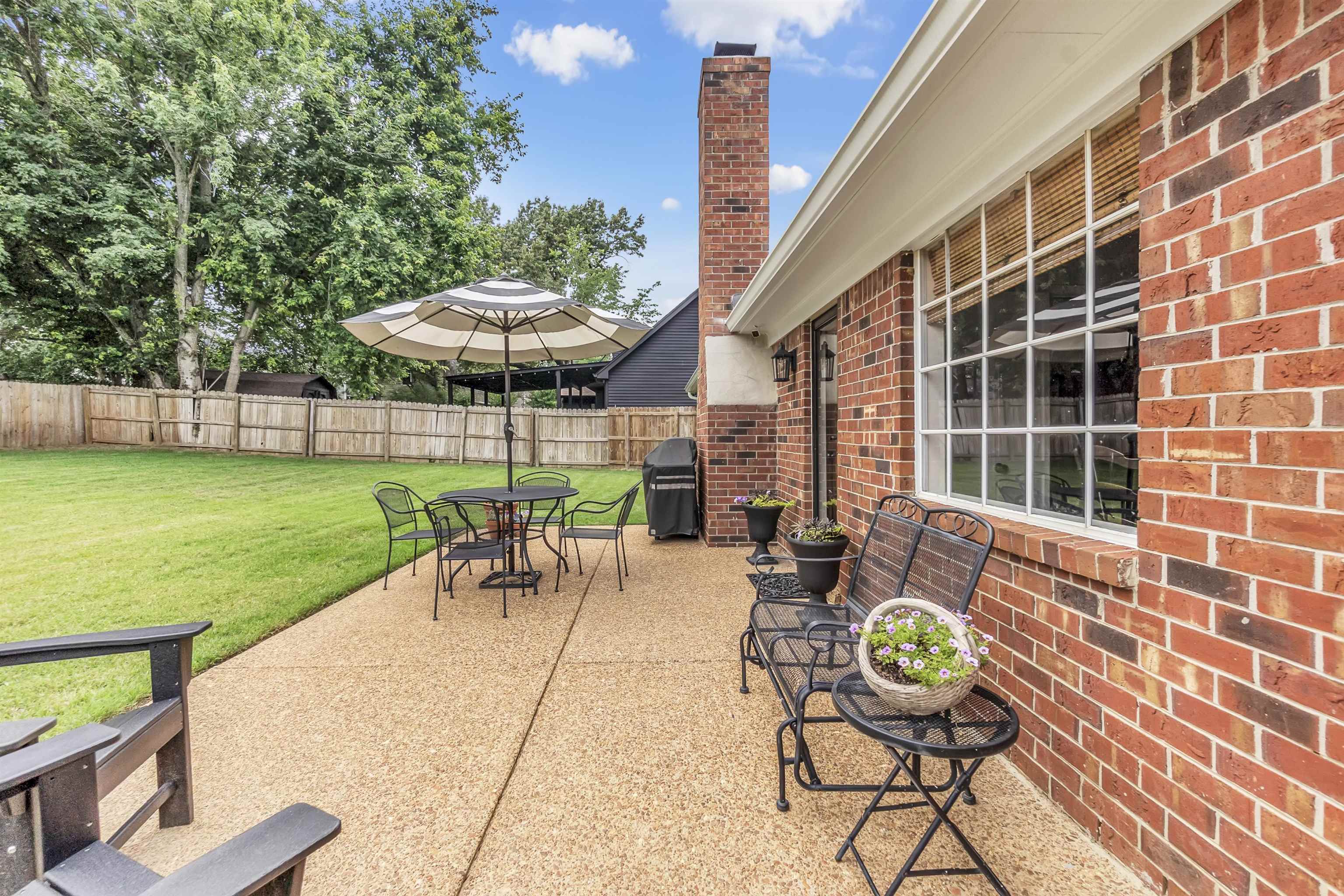 7255 Barnstable Road Memphis, TN 38125 - Photo 24 of 27 View of patio / terrace featuring outdoor dining space and a grill