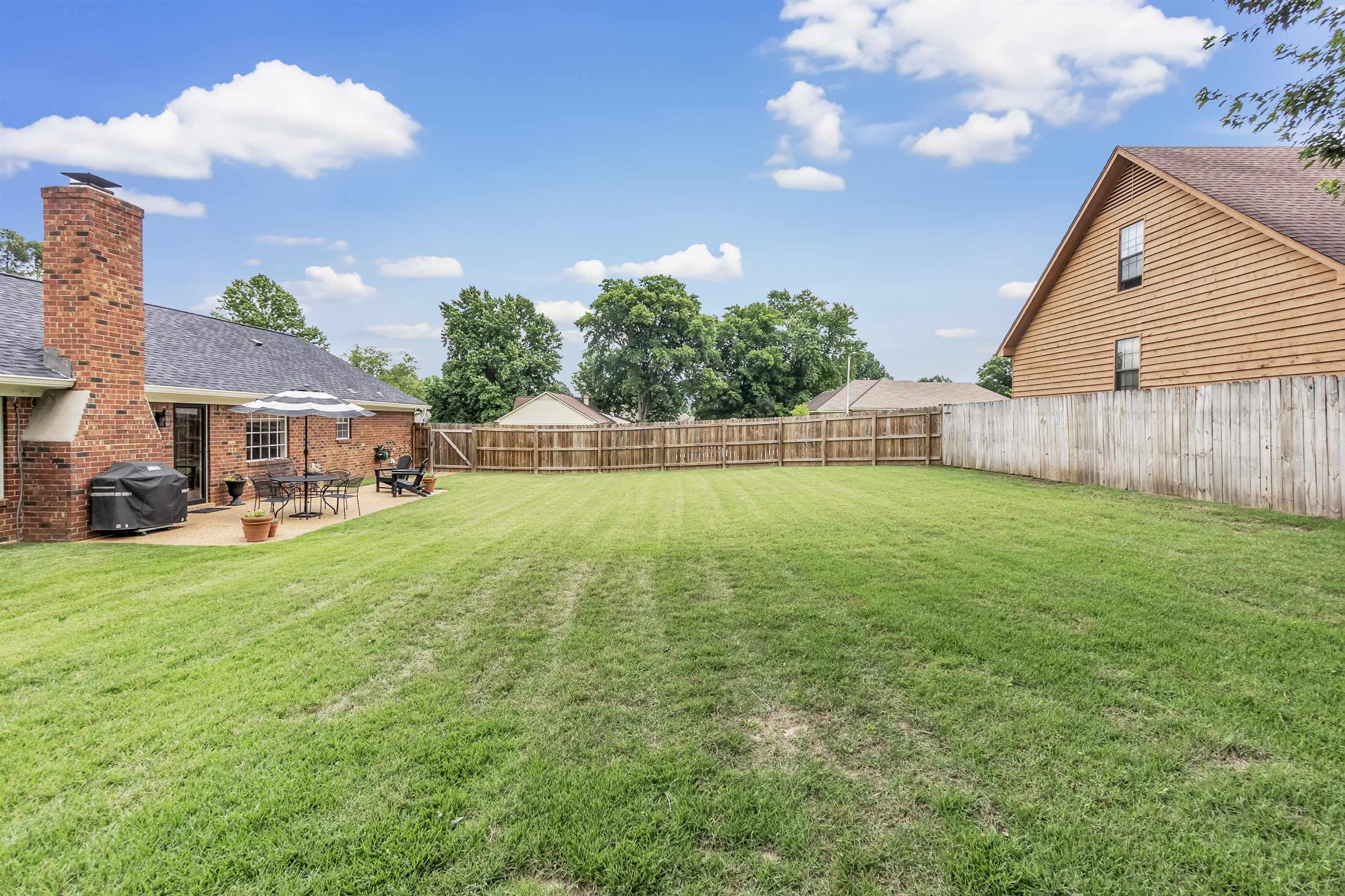 7255 Barnstable Road Memphis, TN 38125 - Photo 25 of 27 View of yard with a patio area